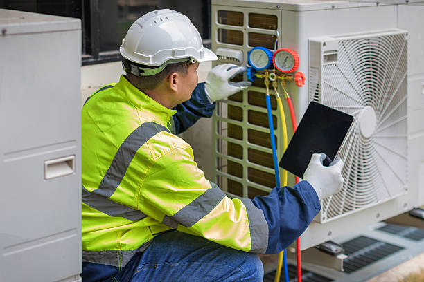 Professional Hvac technician working in Darien Center, NY